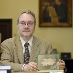 Classics professor Peter van Minnen works with papyri.